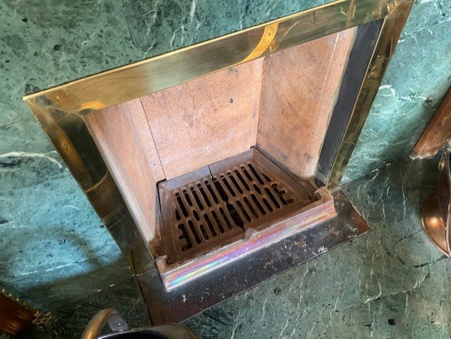 Restored Baxi Underdraught open fire with a new grate and brass frame set into a marble surround in Driffield