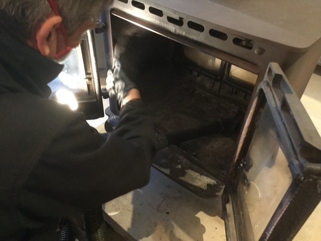 Servicing the firebox with dust kept to a minimum