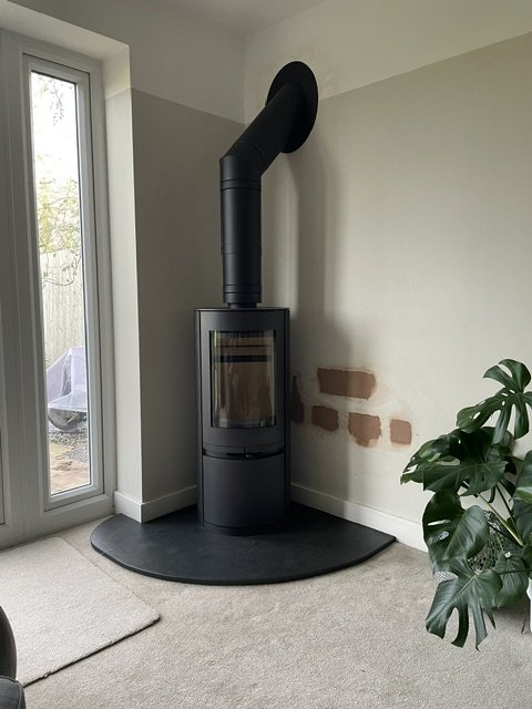 The same corner with the electrics gone and the stove in place