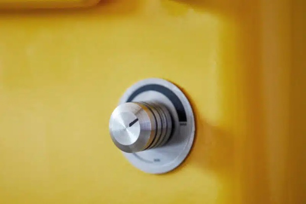 Everhot Electric Heater temperature dial on a yellow finish