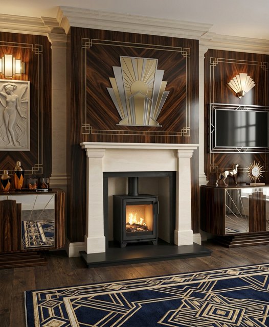 The Arts & Crafts natural limestone fireplace with a matching limestone chamber and matt black granite hearth