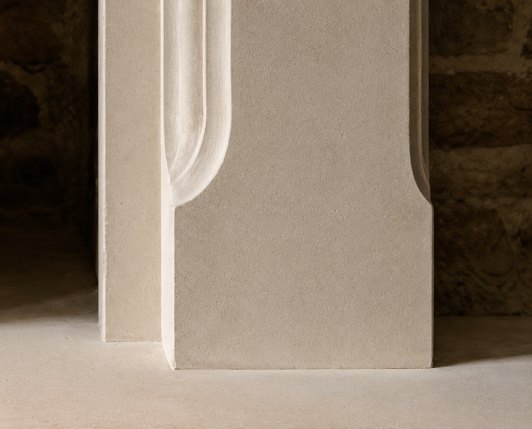 Stepped detailing and natural fossil markings on the Beadlam limestone fireplace