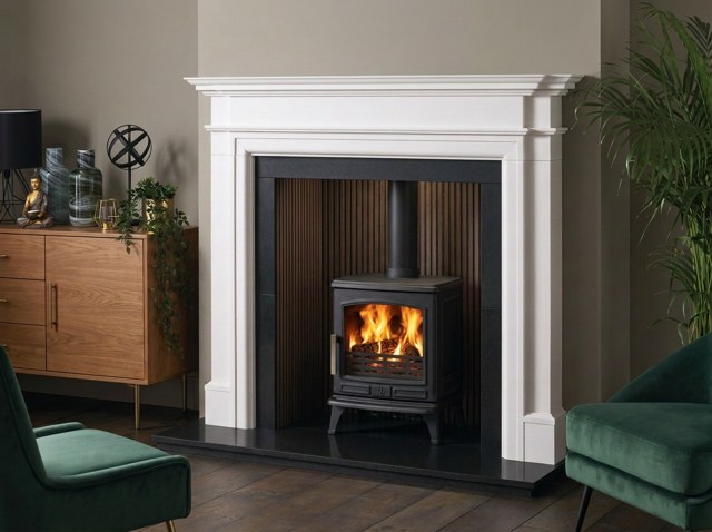 The Waddington limestone fireplace with a walnut dark ceramic chamber
