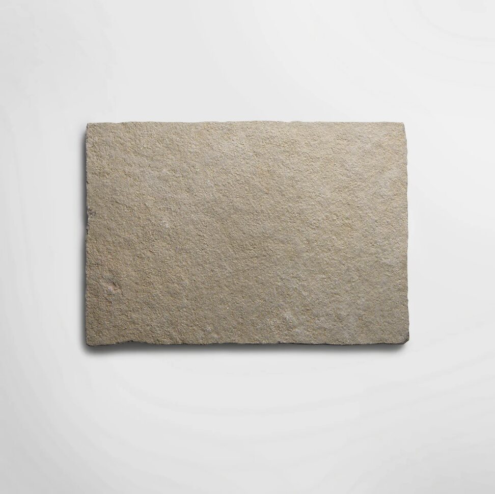 Close up of an aged, hand finished natural stone surface