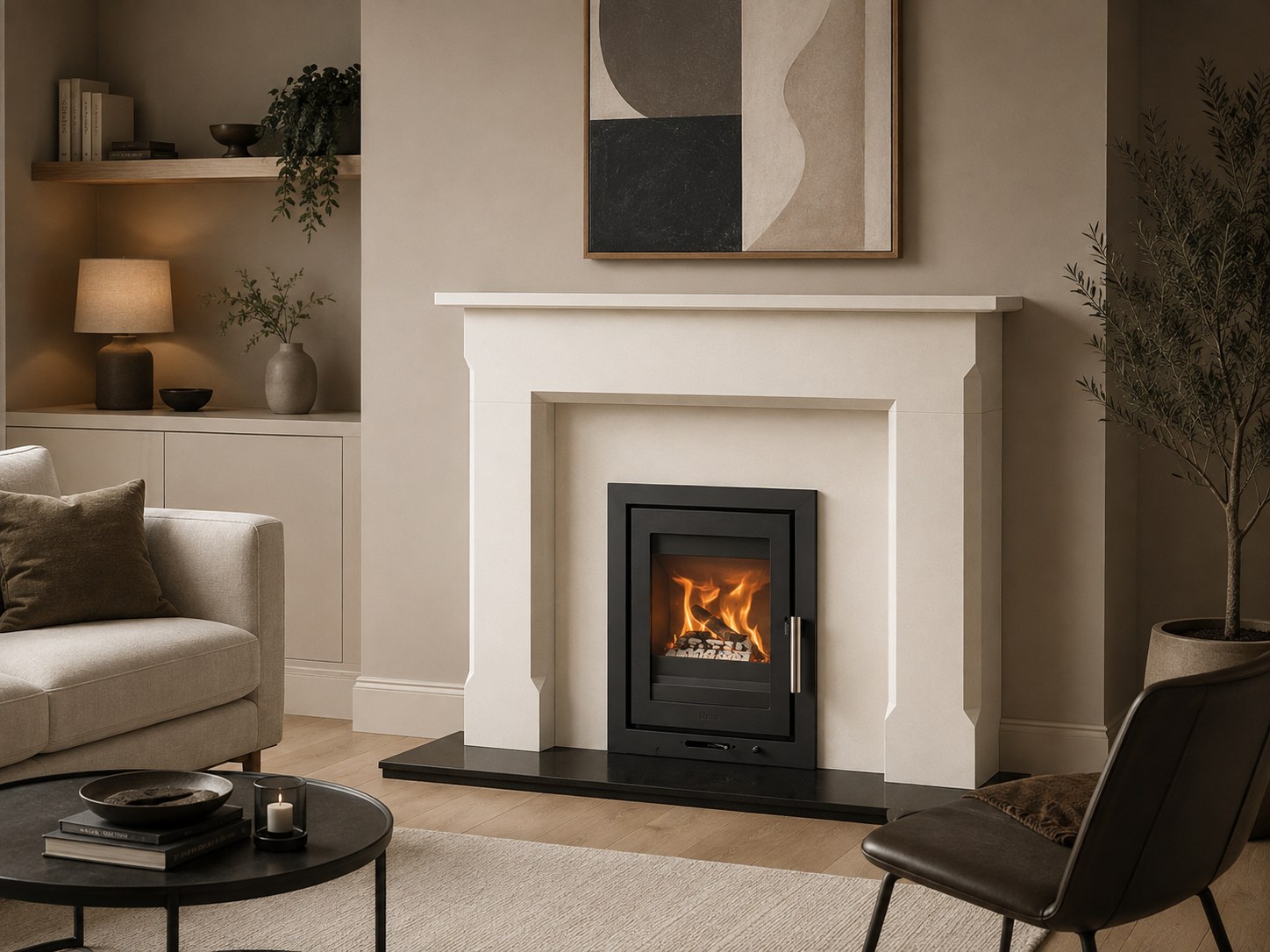 Heta Inspire 40 Cassette set into a Runswick natural limestone fireplace with a black granite hearth