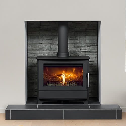 Heta Inspire 55 wood burning stove in a room setting