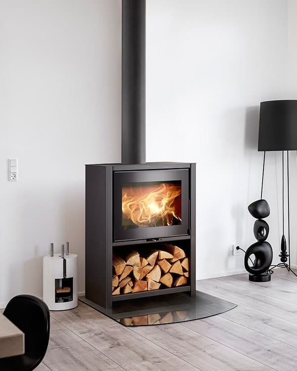 Heta Scan-Line 95H wood burning stove with an integral log store base
